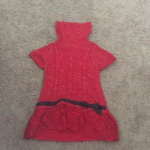 I'm selling a red turtle shirt neck size L 10/12